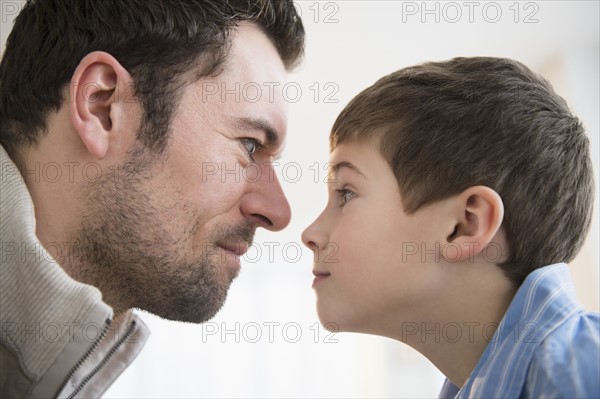 Father and son (8-9) staring at each other.
Photo : Jamie Grill