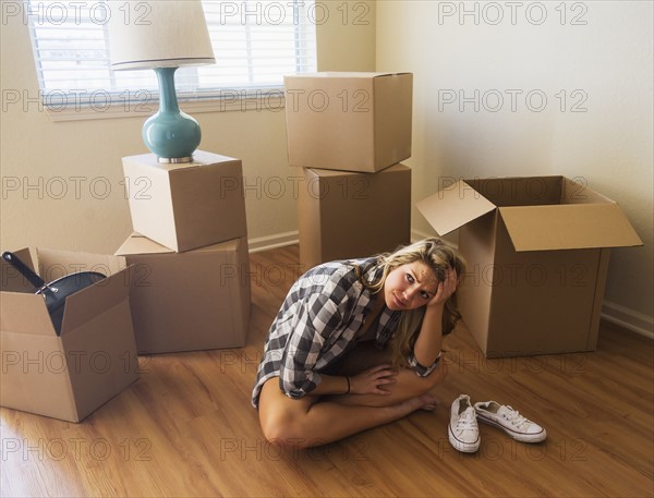 Young woman in new house.
Photo : Daniel Grill