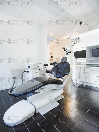 Empty dentist's office with modern equipment.