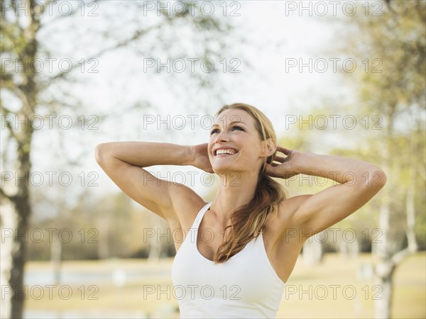 Woman smiling and looking up.