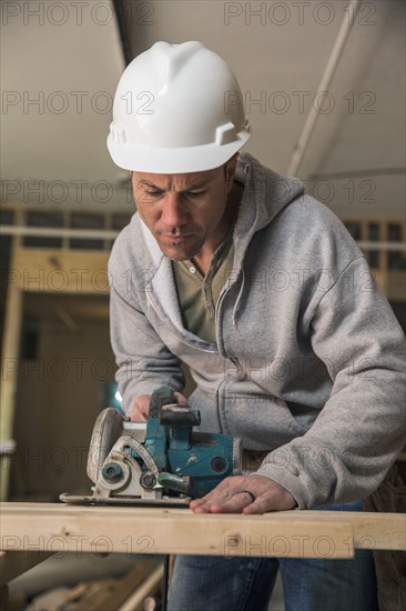 Businessman wearing cowboy hat