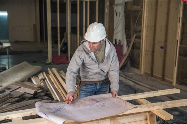 Businessman wearing cowboy hat