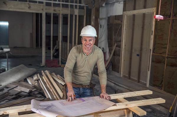 Businessman wearing cowboy hat