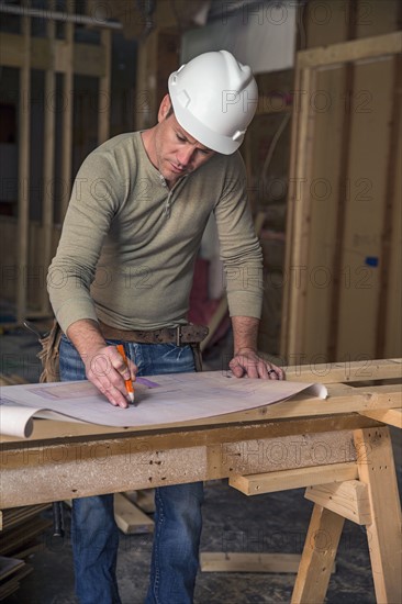 Businessman wearing cowboy hat