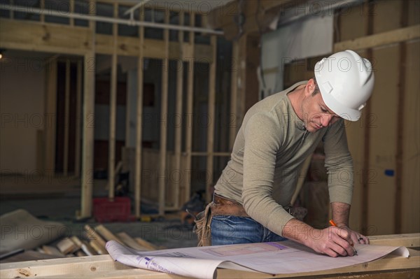 Businessman wearing cowboy hat