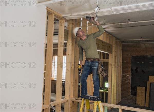 Businessman wearing cowboy hat