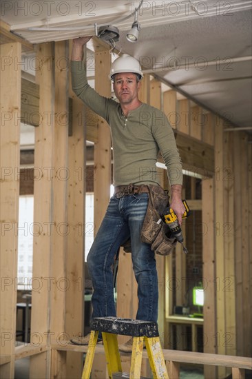 Businessman wearing cowboy hat