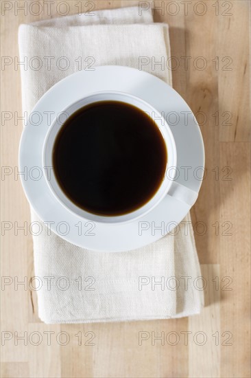 Coffee cup on table .
Photo : Kristin Lee