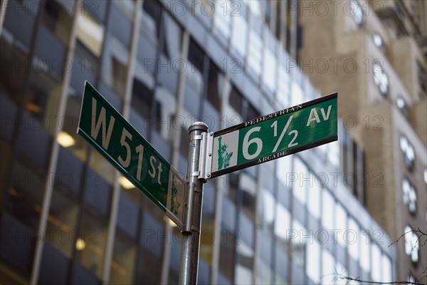 Low angle view of street name sign .
Photo :  Winslow Productions