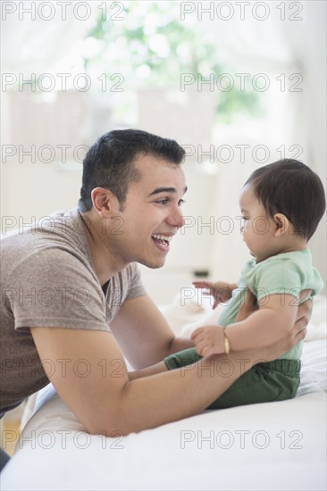 Father playing with his son (6-11 months).