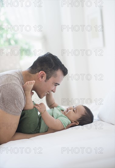 Father playing with his son (6-11 months).