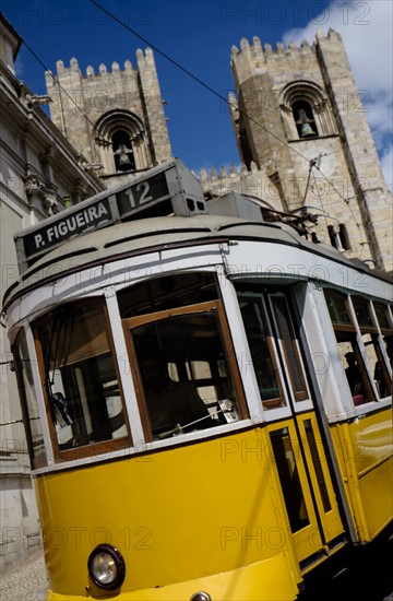 Tram in front of Lisbon Cathedral. Lisbon, Portugal.