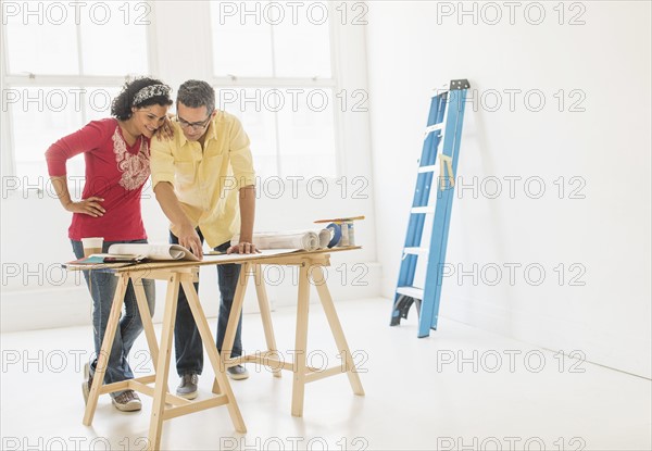 Couple preparing for renovation of new home.