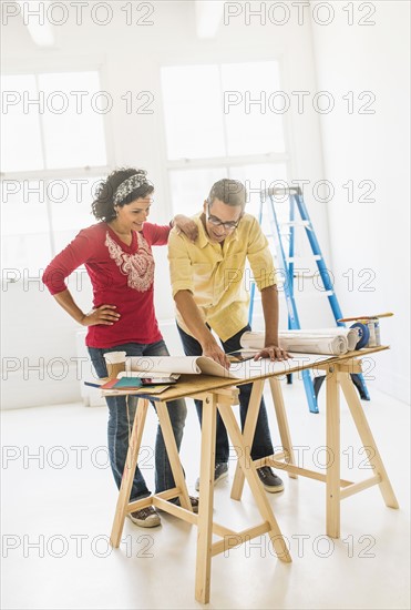 Couple preparing for renovation of new home.