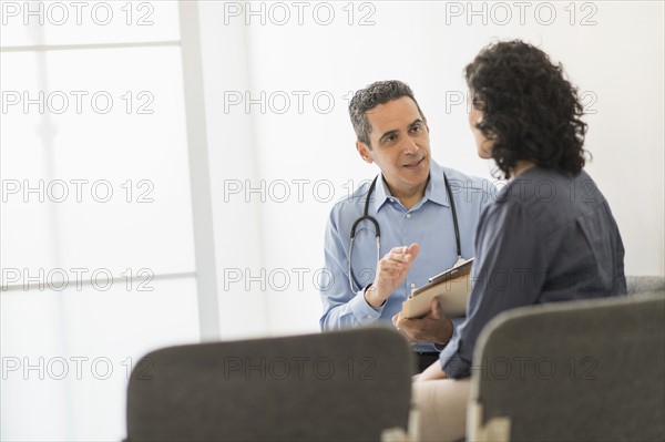 Doctor talking to patient.