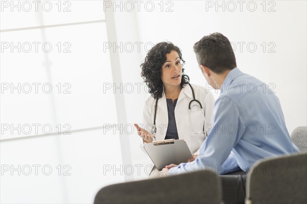 Doctor talking to patient.