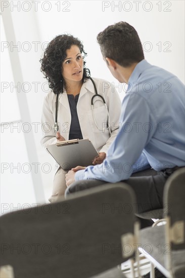 Doctor talking to patient.