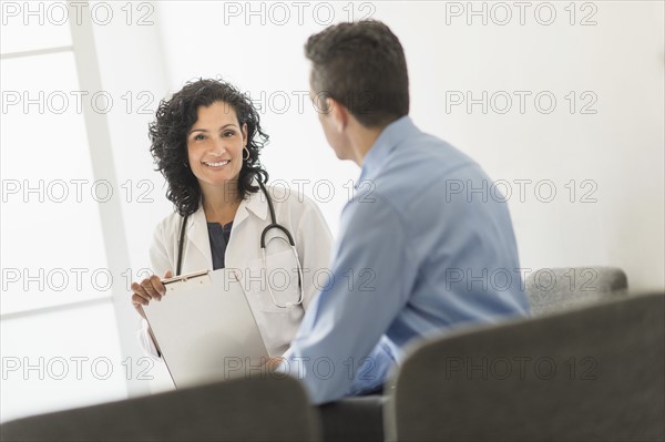 Doctor talking with patient.