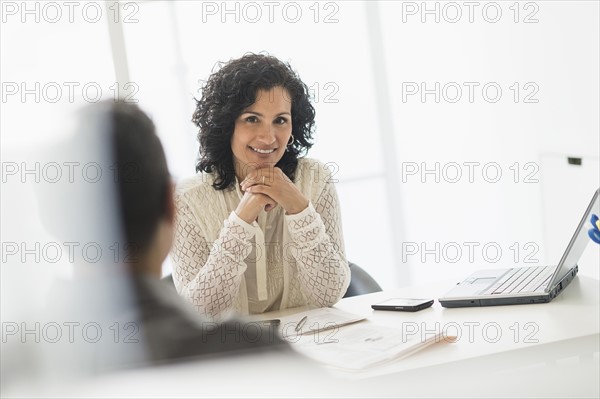 Portrait of businesswoman in office.