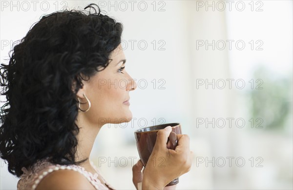 Woman enjoying her tea.