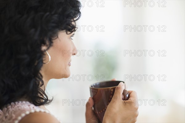 Woman enjoying her tea.