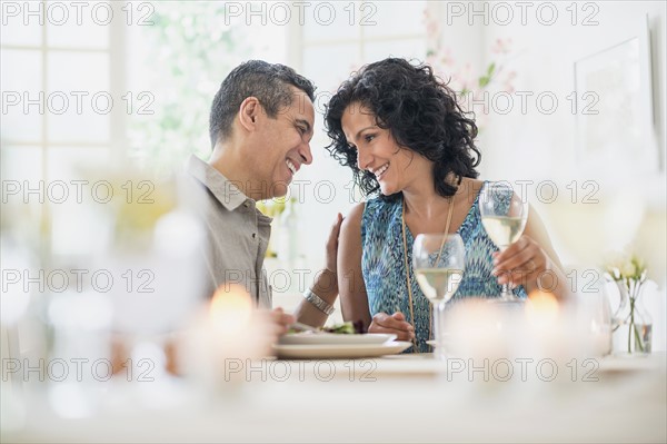 Couple dining in restaurant.