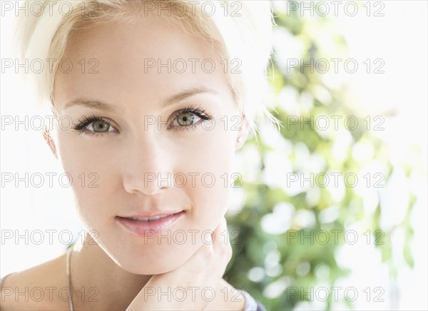 Portrait of blonde woman smiling.