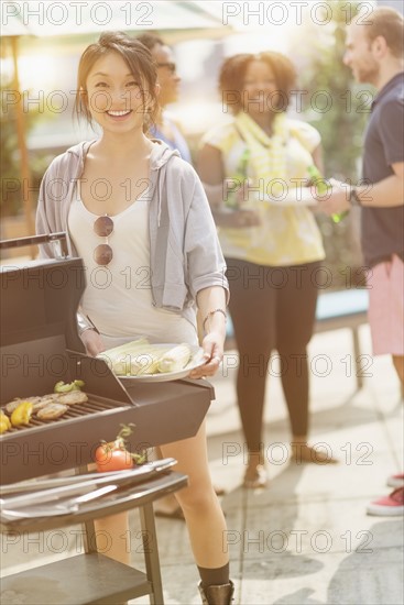 Group of friends enjoying barbeque.