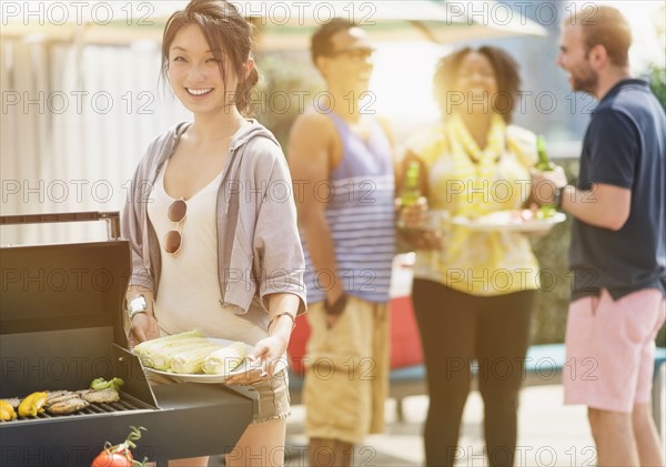 Group of friends enjoying barbeque.