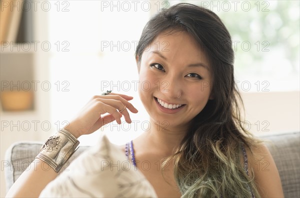 Portrait of young woman smiling.