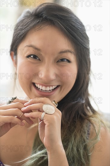 Portrait of young woman smiling.