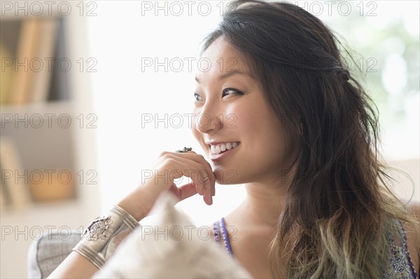 Portrait of young woman smiling.