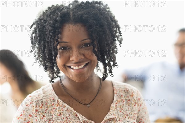 Portrait of smiling woman.