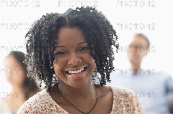 Portrait of smiling woman.