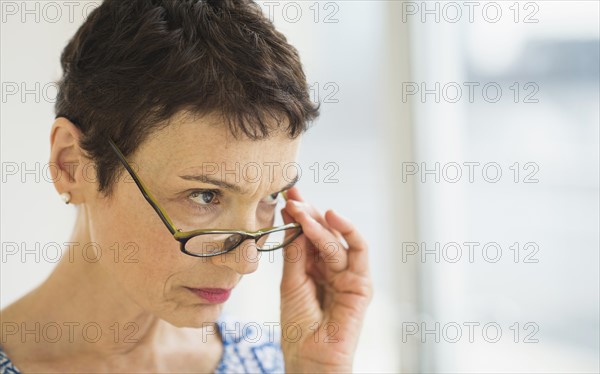 Portrait of senior woman wearing eyeglasses.