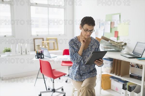 Woman working in home office.