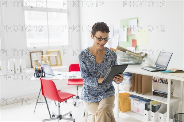 Woman working in home office.