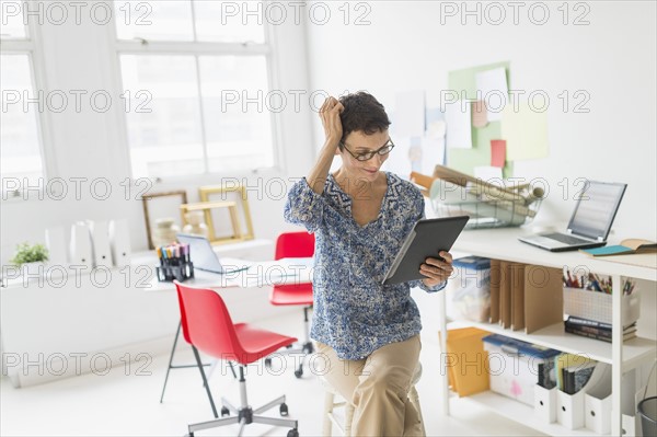 Woman working in home office.