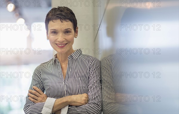 Portrait of smiling businesswoman.