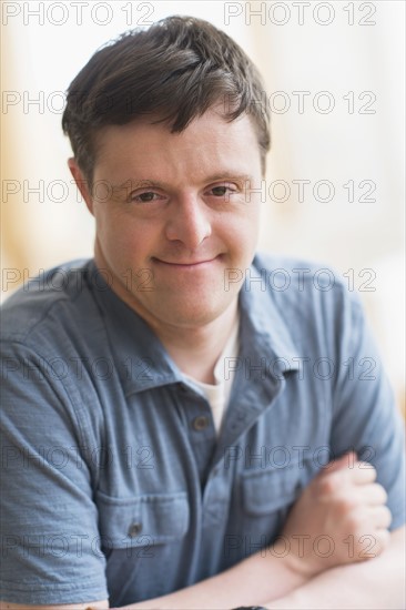 Portrait of man with down syndrome.