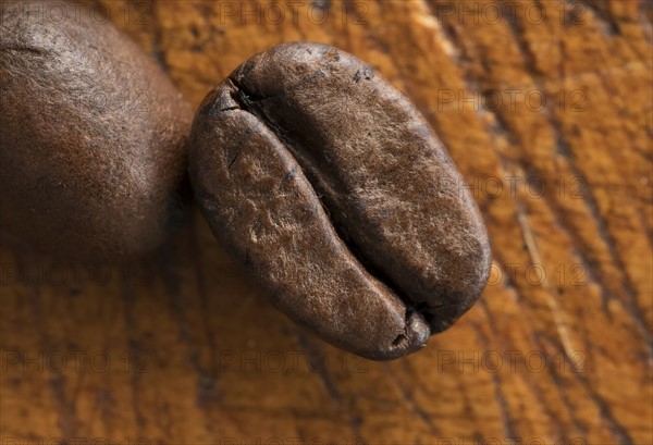 Coffee beans on table.