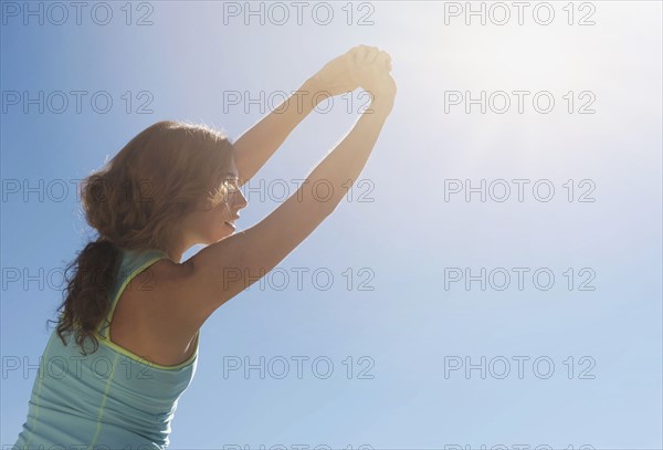 Young woman exercising.