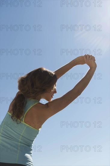 Young woman exercising.