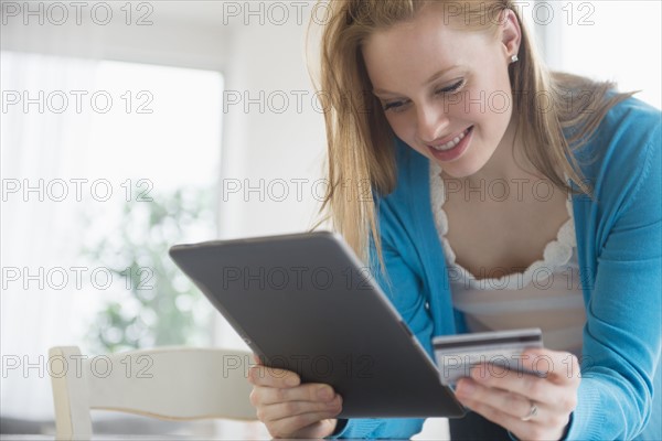 Young woman doing online shopping