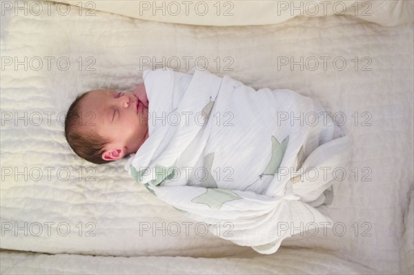 Newborn girl sleeping