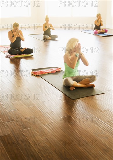 Women exercising yoga