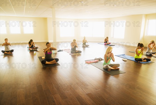 Women exercising yoga