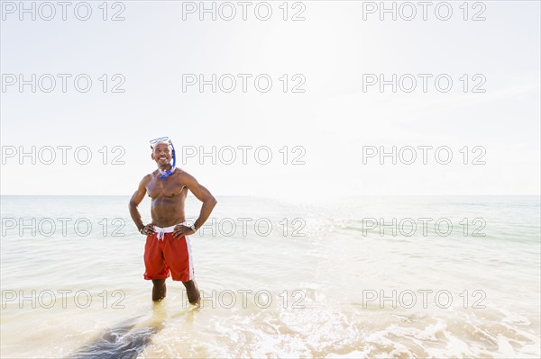Portrait of mature man on beach