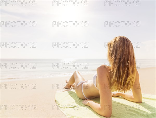 Woman relaxing on beach