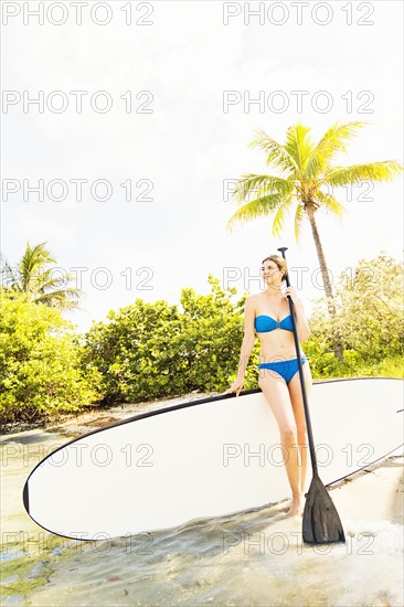 Woman with paddle board